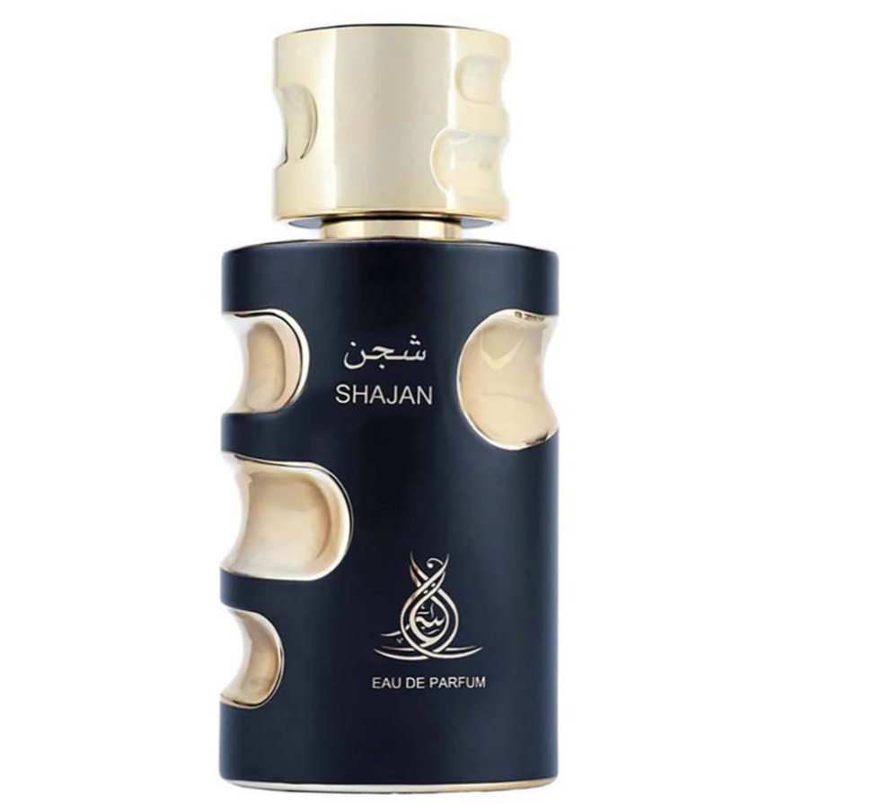 A bottle of Shajan Eau de Parfum with a dark navy blue body, gold accents, and a gold cap, shown on a plain white background. Al Asrar Shajan Feeling Collection Unisex Eau de Parfum 100ml matte navy black bottle with gold oval cutout accents and sculpted gold cap front view on white background - Authentic Perfume Store UPC 6292024022906