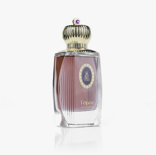 A bottle of Topaz Eau de Parfum by Afnan, featuring a clear glass bottle with a dusty rose liquid, a gold ribbed cap, and a purple label with gold detailing.Al Asrar Topaz Gemstones Collection Unisex Eau de Parfum 100ml ribbed mauve glass bottle with ornate gold crown cap and purple gemstone front view on white background - Authentic Perfume Store UPC 6292024041501