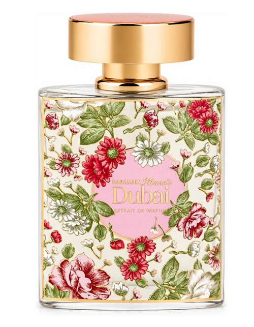 A rectangular glass perfume bottle with a floral print label featuring red, pink, and white flowers with green leaves on a cream background. The bottle has a shiny gold cap and gold lettering that reads 'Marlyssse Mirabelle Dubai'.