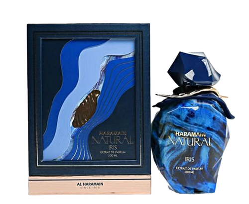 Haramain Natural Iris Extrait de Parfum shown with its dark blue presentation box and the matching faceted glass perfume bottle on a white background.
