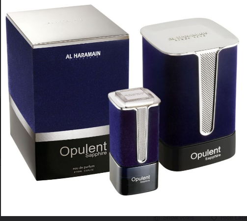 Al Haramain Opulent Sapphire Eau de Parfum shown with its retail box and a smaller travel spray bottle. The packaging and bottle feature a deep navy blue body with a textured metallic silver top and base.