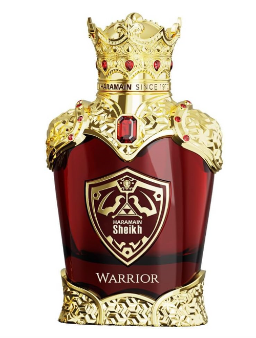 A bottle of Haramain Warrior perfume with a gold crown and ornate gold detailing on a deep red bottle, set against a plain white background.