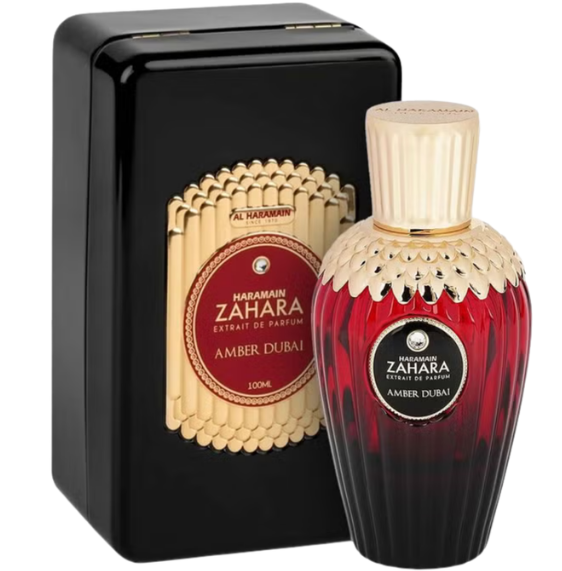 A bottle of Maramshah Maramshah Zahara Amber Dubai Eau de Parfum next to its black rectangular presentation box with a gold and red label, on a white background.