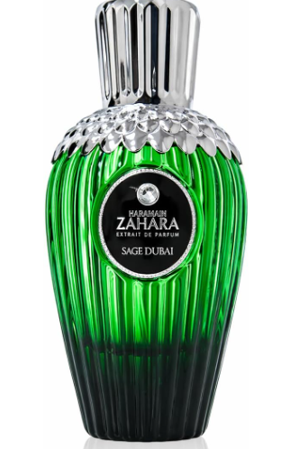 A green and black ribbed glass perfume bottle with a silver cap, featuring a circular black label that reads 'AL HARAMAIN ZAHARA EXTRAIT DE PARFUM SAGE DUBAI'.