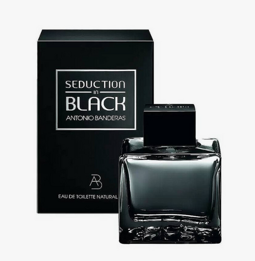 Antonio Banderas Seduction in Black Eau de Toilette Natural, featuring a dark smoky glass bottle with a black cap next to its black packaging box with white text.