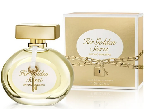 Antonio Banderas Her Golden Secret Eau de Toilette spray bottle and its packaging box. The bottle is a clear rounded glass with pale yellow liquid, a gold rectangular cap, and a white label with gold script.