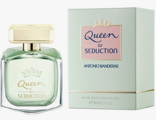 Antonio Banderas Queen of Seduction Eau de Toilette bottle and packaging box. The bottle features a light green glass body with a gold cap, and the box is a pale mint green with a pink label.