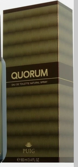 A close-up of a blue Aqua Quorum Eau de Toilette bottle with a bright yellow cap, showing the brand name and product type on the front.