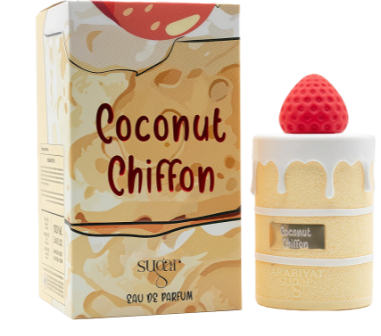 Sacher Coconut Chiffon Eau de Parfum bottle and its matching illustrated box. The bottle is designed to look like a dessert with a yellow-beige body, white dripping icing, and a red strawberry on top, next to its packaging box which features a matching coconut-chip style illustration.