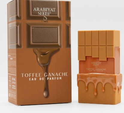 Arabiyat Sugar Toffee Ganache Eau De Parfum shown with its brown chocolate-bar-themed box and the matching perfume bottle, both decorated with caramel drip graphics.