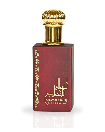 A rectangular dark red perfume bottle with a shiny gold cap and gold Arabic calligraphy on the front, labeled 'AHLAM AL KHALEEJ EDP DE PARFUM'.