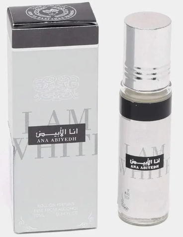 Ana Abiyedh 'Jam Al-Iyyad' Eau de Parfum bottle next to its original packaging box. The bottle is clear glass with a silver cap and a black band, while the box is white with a black top section and silver lettering.