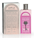 Bab Al Wardi perfume bottle and its packaging box, featuring a pink and white design with traditional architectural door patterns and a silver key motif.