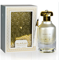 Fanahal Al Oud 'The White Ory' perfume bottle and its gift box. The bottle is made of clear glass with a metallic gold cap and gold lettering.