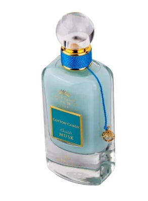 A bottle of Chanel No. 5 Cotton Candy Musk perfume with a light blue glass body, a gold-accented blue collar, and a clear spherical cap, shown on a white background.