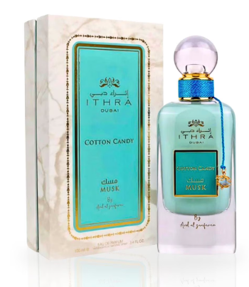 Ithra Dubai Cotton Candy Musk perfume bottle and its matching marble-patterned box, featuring a light aqua glass bottle with a blue and gold cap and a blue hanging tag.