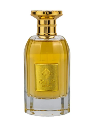 A clear glass perfume bottle filled with golden-yellow liquid, featuring a shiny gold cap and a gold square label with the brand name 'Oud' and '1975' printed on it, set against a plain white background.