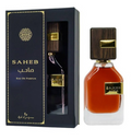 SAHAB Eau de Parfum bottle with amber liquid and dark wood cap next to its black presentation box with gold detailing.