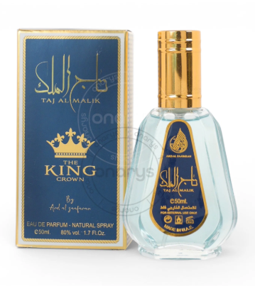 Taj Al Malik The King Crown Eau de Parfum 50ml bottle next to its blue and gold packaging box, on a white background with a faint watermark.