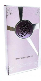 A light pink rectangular box for Zahoor France EDP, featuring a metallic silver cross design and a circular purple emblem with Arabic calligraphy.