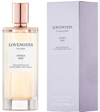 A bottle of Arianza Lovenotes by Arianza Angels Kiss rose water-velvet ambered dark vanilla Eau de Parfum next to its light lavender packaging box.