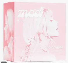 A pink rectangular product box with a stylized illustration of a woman's face and the text 'mod' and 'Blossom' on the front, shown against a white background.