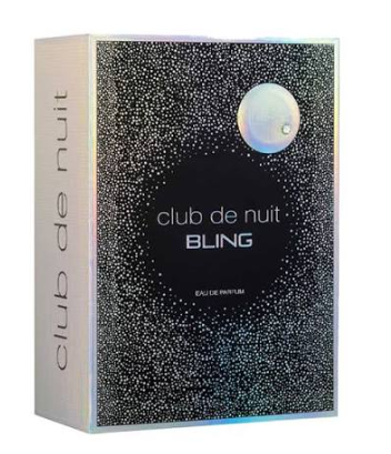 Club de Nuit Bling Eau de Parfum box packaging, featuring a black front with a silver speckled starry pattern, a silver moon graphic, and a white side panel with vertical text.