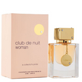Club de Nuit Woman perfume bottle and its matching pink packaging box, featuring a gold cap and gold circular pendant on a white background.