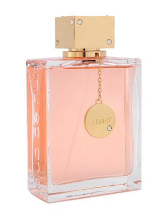 A rectangular glass perfume bottle filled with pale peach-pink liquid, featuring a gold cap, a hanging gold circular charm engraved with 'ABNBAE', and clear rhinestone accents on the cap and charm.