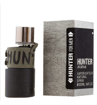 Hunter Incense Vaporisateur for Men perfume bottle and packaging box on a white background. The bottle has a dark gray base, a textured olive green collar with 'HUN' in black, and a shiny silver cap.