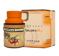 A bottle of Mandarin Sky Vintage Edition eau de parfum next to its retail box, featuring a vibrant orange cap and a beige label with illustrations of mandarin oranges.