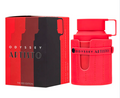 Odyssey Artisto The Red Edition fragrance bottle in a bright red silicone sleeve next to its red and black packaging box on a white background.
