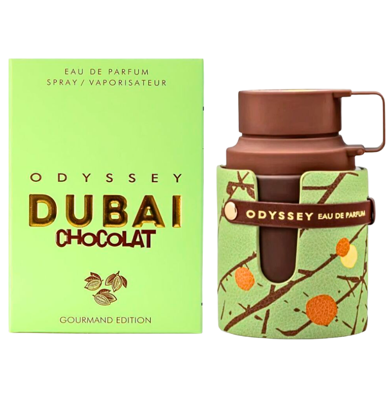 Odyssey Dubai Chocolat Eau de Parfum bottle with its light green packaging box on a white background. The bottle features a brown cap and body, wrapped in a green sleeve with chocolate-coated cocoa bean illustrations.