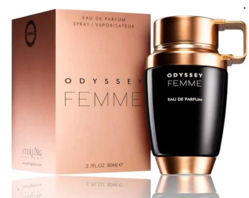 Odyssey Femme Eau de Parfum bottle and its packaging box by Sterling Sintra, featuring a black bottle with a metallic rose gold cap and base next to its matching rose gold box.
