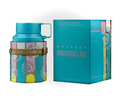 Odyssey Marshmallow cologne bottle and its matching box, both featuring a bright turquoise blue color with a colorful geometric pattern in pink, yellow, and purple, and a brown leather strap on the bottle.