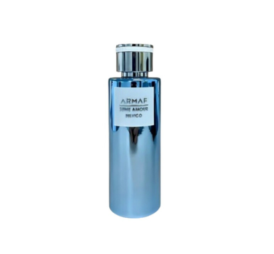 A cylindrical metallic blue perfume bottle with a silver cap and a white label reading 'ARMAF STINIF AMOUR' on a plain white background.