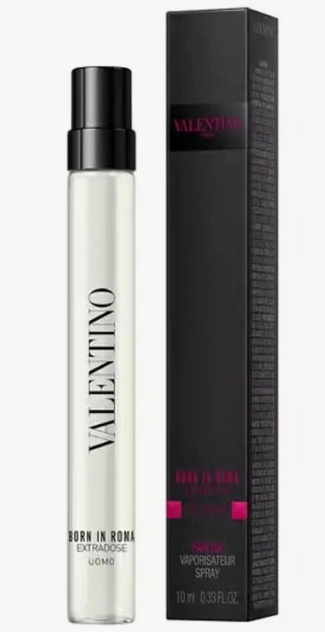A bottle of Valentino Born in Roma Extraordinaire Parfums de Marly perfume spray next to its black packaging box, shown on a plain white background.