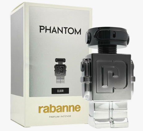 A bottle of Rabanne Phantom Elixir Parfum Intense next to its packaging box. The bottle is designed like a metallic silver and black robot head with a clear base, and the box is white and silver with gold and black text.