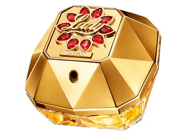 Paco Rabito Lady Royal perfume bottle, featuring a faceted gold geometric design with red crystal flower accents and the brand name 'Lady Royal' on the top panel.