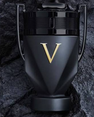 A black metallic trophy-style bottle with a large gold letter V on the front, set against a dark textured stone background.