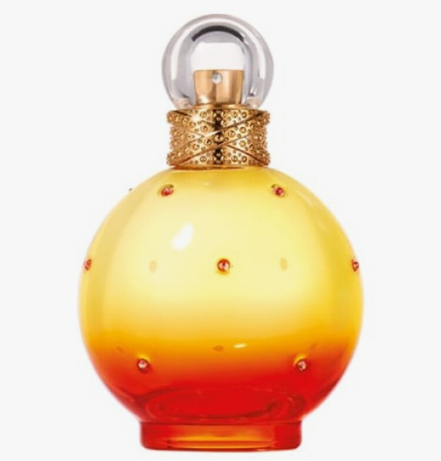 A spherical glass perfume bottle with a yellow-to-red gradient, decorated with small red gem-like accents and a gold patterned neck, topped with a clear glass loop cap, on a white background.