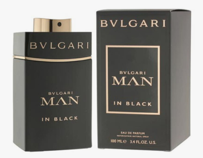 Bvlgari Man In Black Eau de Parfum bottle and its retail box, both in black with gold lettering and trim, on a white background.