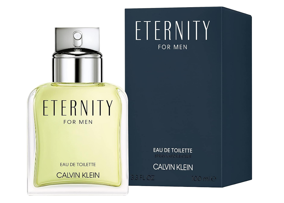 Calvin Klein Eternity For Men Eau de Toilette 100ml bottle with pale yellow-green liquid next to its dark navy blue packaging box, on a white background.