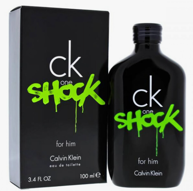 Calvin Klein CK One Shock For Him Eau de Toilette bottle and packaging box. The bottle and box are black with the brand name 'ck' in white and 'shock' in a bright green dripping font.