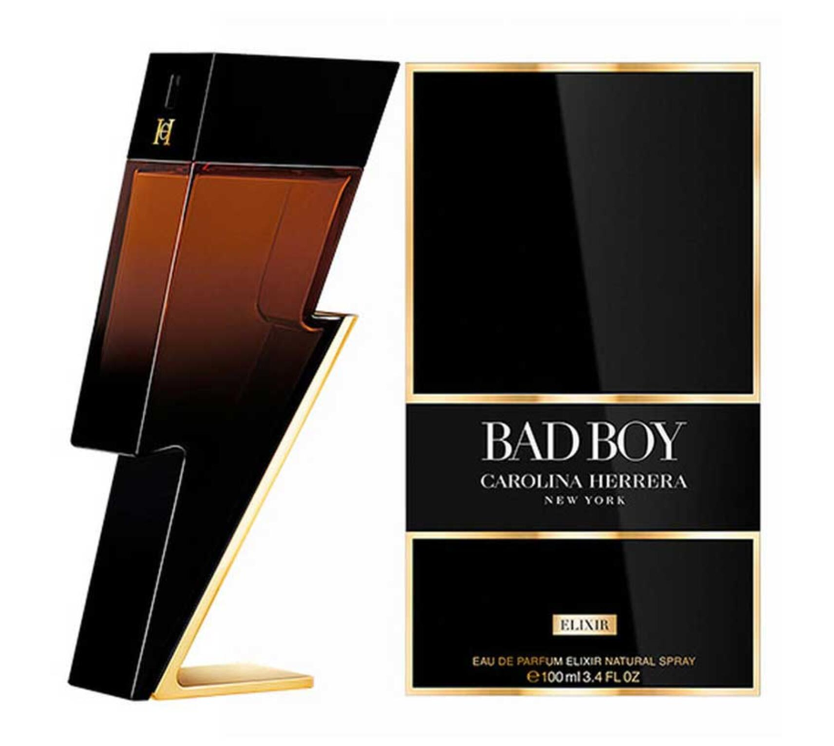 Bad Boy Eau de Parfum by Carolina Herrera, featuring a modern black and amber bottle next to its black and gold retail box on a white background.