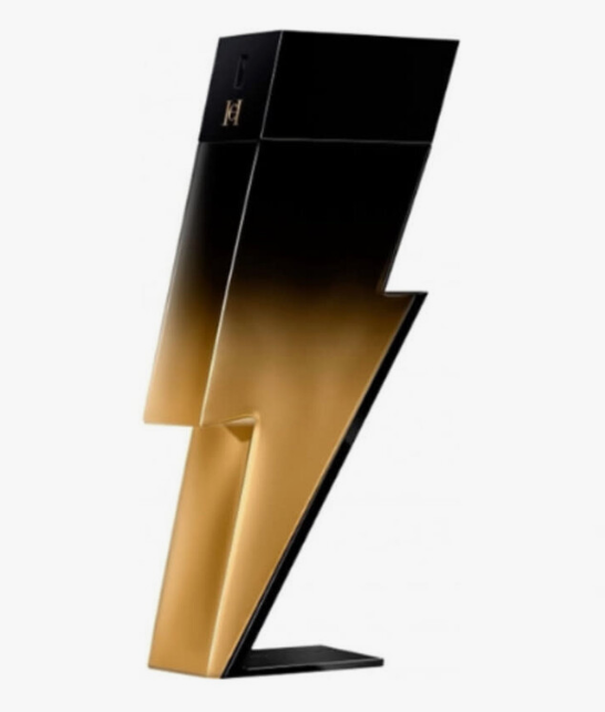 A modern lightning-bolt-shaped perfume bottle with a glossy black-to-gold gradient finish, standing on a small black base against a plain white background.