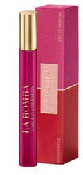 Carolina Herrera La Bomba Eau de Parfum 10ml spray bottle with a gold cap next to its pink and red packaging box.