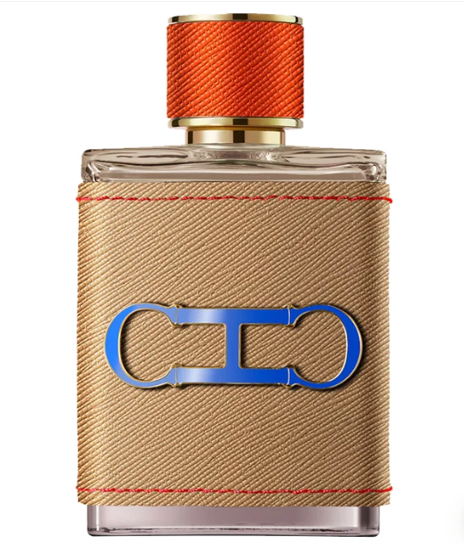 A rectangular glass perfume bottle wrapped in a tan textured fabric sleeve with red stitching, a blue metallic Celine logo on the front, and an orange ribbed cap, shown on a white background.
