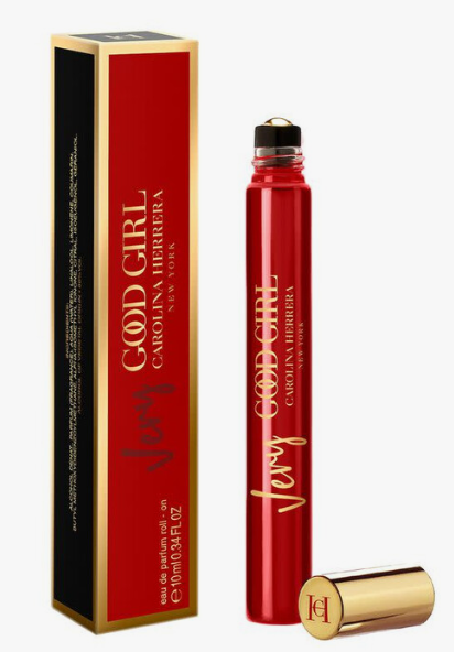 Carolina Herrera Very God Girl perfume rollerball bottle and its packaging box, both in red and gold, with the gold cap placed beside the bottle on a white background.