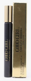 A small black perfume bottle with a gold cap stands next to its matching gold box. The bottle and box are printed with the text 'COD GIRL' and 'Carolina Herrera'.
